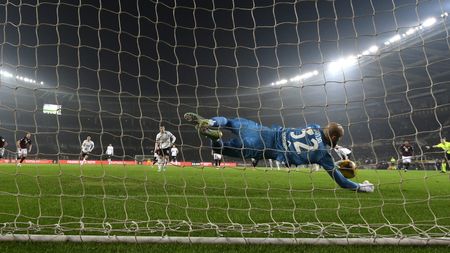 TURIN, ITALY - FEBRUARY 22: Vanja Milinkovic-Savic of Torino saves a penalty from Christian Pulisic of AC Milan during the Serie A match between Torino and AC Milan at Stadio Olimpico di Torino on February 22, 2025 in Turin, Italy. (Photo by Claudio Villa/AC Milan via Getty Images)