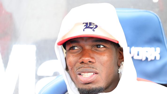 CHESTERFIELD, ENGLAND - JULY 19: Paul Pogba of AS Monaco in the dug out ahead of the pre-season friendly match between Nottingham Forest and AS Monaco at SMH Group Stadium on July 19, 2025 in Chesterfield, England. (Photo by Clive Mason/Getty Images) Pogba