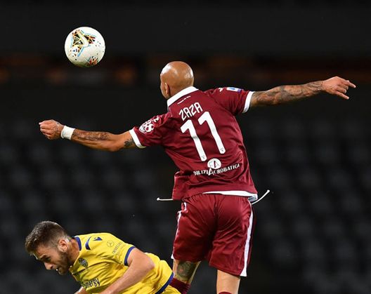 TURIN, ITALY - JULY 22: Simone Zaza (R) of Torino FC clashes with Alan Empereur of Hellas Verona during the Serie A match between Torino FC and Hellas Verona at Stadio Olimpico di Torino on July 22, 2020 in Turin, Italy. (Photo by Valerio Pennicino/Getty Images)