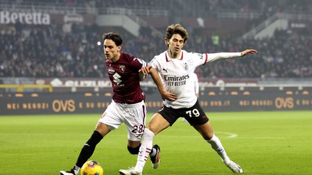 TURIN, ITALY - FEBRUARY 22: Samuele Ricci of Torino competes for the ball with Joao Felix of AC Milan during the Serie A match between Torino and AC Milan at Stadio Olimpico di Torino on February 22, 2025 in Turin, Italy. (Photo by Claudio Villa/AC Milan via Getty Images)