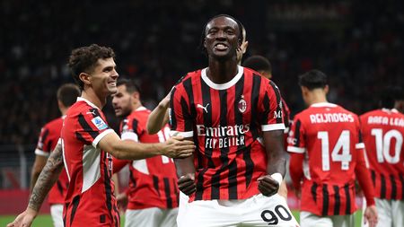 MILAN, ITALY - SEPTEMBER 14: Tammy Abraham of AC Milan celebrates his goal with his team-mate Christian Pulisic during the Serie A match between AC Milan and Venezia at Stadio Giuseppe Meazza on September 14, 2024 in Milan, Italy. (Photo by Marco Luzzani/Getty Images)