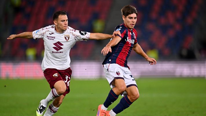 BOLOGNA, ITALY - OCTOBER 29: Krjstian Aslani of Torino competes for the ball with Benjamin Domínguez of Bologna FC during the Serie A match between Bologna FC 1909 and Torino FC at Renato Dall'Ara Stadium on October 29, 2025 in Bologna, Italy. (Photo by Alessandro Sabattini/Getty Images) UFFICIALE – Dominguez in lista al posto di Freuler - immagine 1