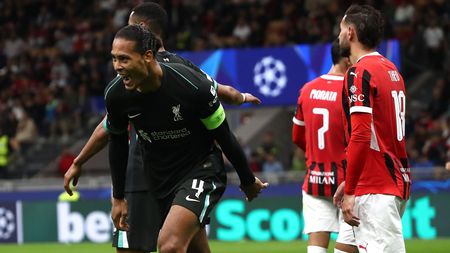 MILAN, ITALY - SEPTEMBER 17: Virgil van Dijk of Liverpool FC celebrates his goal during the UEFA Champions League 2024/25 League Phase MD1 match between AC Milan and Liverpool FC at Stadio San Siro on September 17, 2024 in Milan, Italy. (Photo by Marco Luzzani/Getty Images)