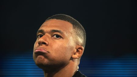 PARIS, FRANCE - SEPTEMBER 19: Kylian Mbappe of Paris Saint-Germain looks on during the UEFA Champions League Group F match between Paris Saint-Germain and Borussia Dortmund at Parc des Princes on September 19, 2023 in Paris, France. (Photo by Johannes Simon/Getty Images) Mbappé