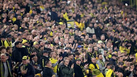 DORTMUND, GERMANY - OCTOBER 04: Fans Borussia Dortmund react during the UEFA Champions League match between Borussia Dortmund and AC Milan at Signal Iduna Park on October 04, 2023 in Dortmund, Germany. (Photo by Christof Koepsel/Getty Images)