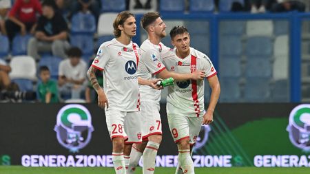 REGGIO NELL'EMILIA, ITALY - OCTOBER 02: Lorenzo Colombo of Monza celebrates with teammate Georgios Kyriakopoulos after scoring their side's first goal during the Serie A TIM match between US Sassuolo and AC Monza at Mapei Stadium - Citta' del Tricolore on October 02, 2023 in Reggio nell'Emilia, Italy. (Photo by Alessandro Sabattini/Getty Images)