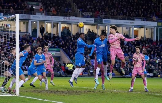 Leeds United's Ethan Ampadu (second right) scores their side's third goal of the game during the Emirates FA Cup Third Round match at the Weston Homes Stadium, Peterborough. Picture date: Sunday January 7, 2024. (Photo by Joe Giddens/PA Images via Getty Images)