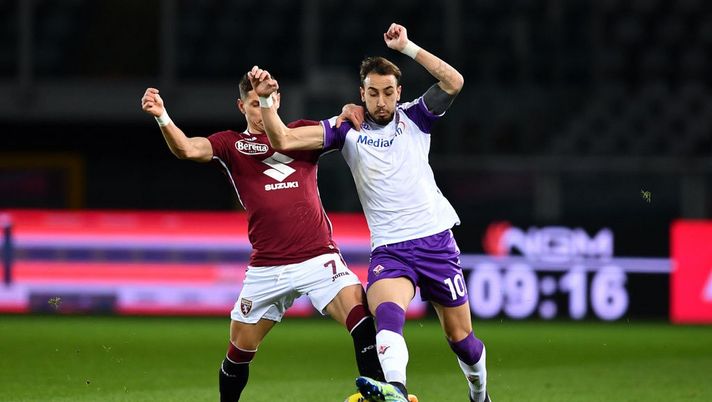 TURIN, ITALY - JANUARY 29: Gaetano Castrolvilli of Fiorentina battles with Sasa Lukic of Torino during the Serie A match between Torino FC and ACF Fiorentina at Stadio Olimpico di Torino on January 29, 2021 in Turin, Italy. (Photo by Valerio Pennicino/Getty Images) Torino-Fiorentina 0-0: Vlahovic e Zaza, un legno per parte - immagine 1