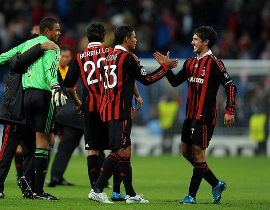 MADRID, SPAIN - OCTOBER 21: Pato (R) of AC Milan celebrates with his teammate Thiago Silva (2nd R) at the end of the Champions League group C match between Real Madrid and AC Milan at the Estadio Santiago Bernabeu on October 21, 2009 in Madrid, Spain. AC Milan won the match 3-2. (Photo by Jasper Juinen/Getty Images) Milan e Real Madrid: il leggendario derby d’Europa- immagine 11