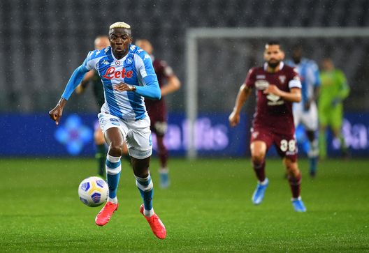 TURIN, ITALY - APRIL 26: Victor Osimhen of Napoli runs with the ball during the Serie A match between Torino FC and SSC Napoli at Stadio Olimpico di Torino on April 26, 2021 in Turin, Italy. Sporting stadiums around Italy remain under strict restrictions due to the Coronavirus Pandemic as Government social distancing laws prohibit fans inside venues resulting in games being played behind closed doors. (Photo by Valerio Pennicino/Getty Images)
